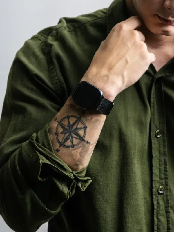 Hand with Eye and Barbed Wire Tattoo