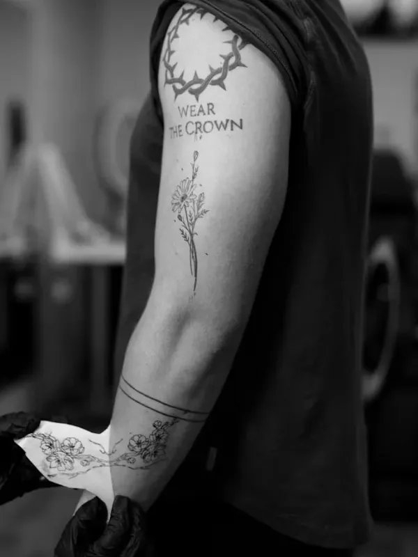 Botanical Crown Arm Tattoo